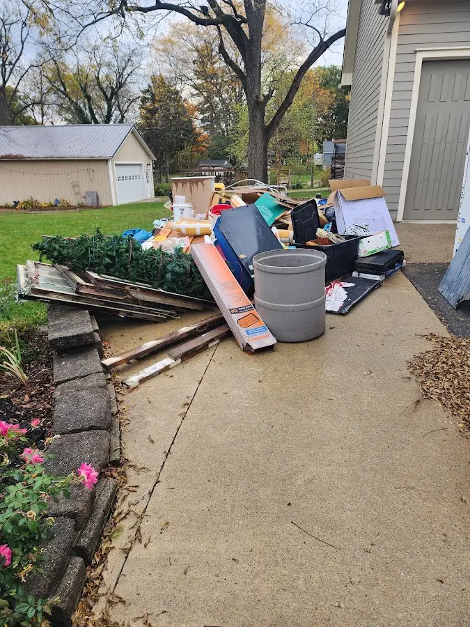 Dumpster being loaded with debris for 3 Yard Dumpster Rental in New Paltz